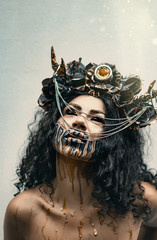 girl demon in a wreath with horns portrait, uniform background, holiday Halloween