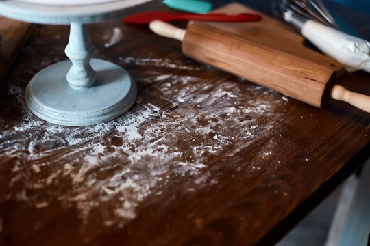 Messy Kitchen Table After Baking Cake, Close Up Cropped Photo.