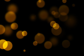 christmas glitter golden sparkle background with bokeh on black, gold holiday festive event happy new year