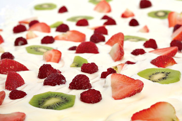 Kiwi, raspberry, strawberry and whipped cream.