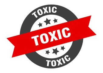 Fototapeta premium toxic sign. toxic black-red round ribbon sticker