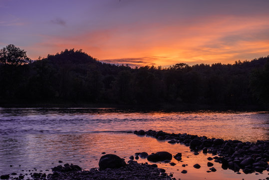 River and forest at sunset
