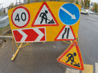 Photography of signs' pull. Prohibitory, permissive and warning road signs. Traffic Compliance Concept
