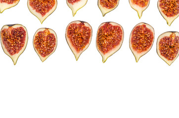 Sliced figs in a cut on a white background, isolated fruit clipping. Copy space