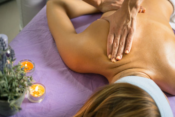 Female relaxing back massage with hands. Beauty body skin care treatment concept.