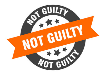 Fototapeta premium not guilty sign. not guilty orange-black round ribbon sticker
