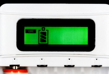 Battery Charging Process. Green Screen With Battery Indicator. battery charger Close Up