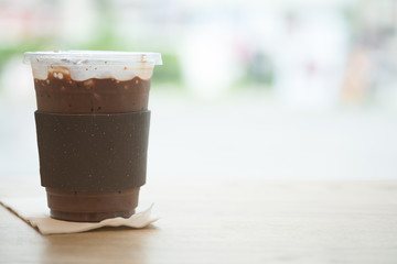 Iced coffee mocha in takeaway cup