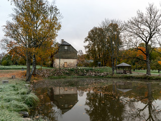 Fototapeta premium beautiful photograph with colorful trees on the water's edge, beautiful reflections, November