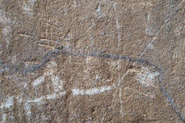 an old wall with scratches