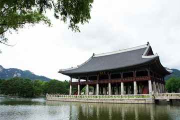 Ancient architecture surrounded by ponds inside a Korean palace