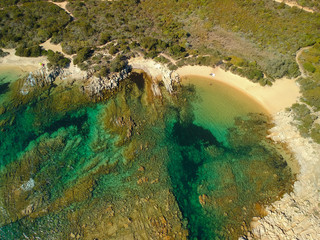Corsica Figari Testa beach water and rocks aerial view