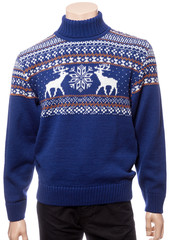 Blue knitted Christmas turtleneck sweater on a mannequin isolated