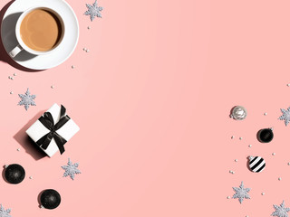 Christmas ornaments with a cup of coffee - flat lay