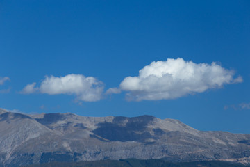 clouds blue sky flyffy autumn background in Greece