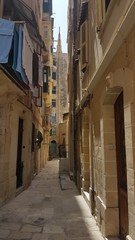 Fototapeta na wymiar narrow street in old town of lisbon portugal