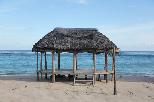 Beach fale, a simple open 'hut' (faleo'o Samoan language), popular in budget eco-tourism in Samoa. Beautiful day fale at Lalomanu Beach
