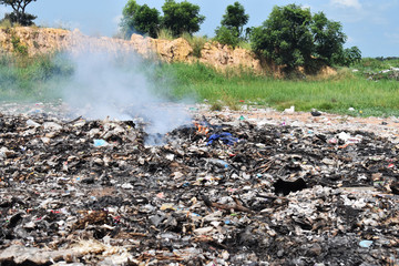 Burning garbage heap of smoke from a burning pile of garbage
