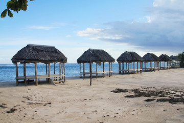 Beach fale, a simple open 'hut' (faleo'o Samoan language), popular in budget eco-tourism in Samoa. Beautiful day fale at Lalomanu Beach © peacefoo