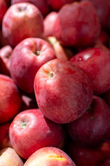 Fototapeta na wymiar Apple fruit background, new harvest of red apples, close up