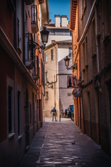 Fototapeta na wymiar Jaca, Huesca / Spain »; September 29, 2019: A man's walk through the old town of Jaca