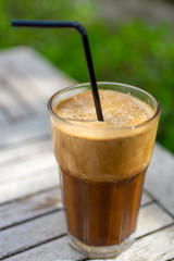 Traditional greek cold coffee Frappe made from water, instant coffee and ice cubes