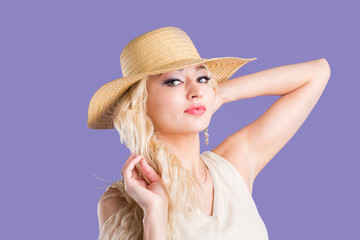 Blonde woman on purple background