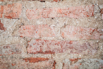 background and wallpaper texture Empty Old Brick Wall Texture. Painted Distressed Wall Surface. Grungy Wide Brick wall. Grunge Red Stonewall Background. Shabby Building Facade With Damaged Plaster.