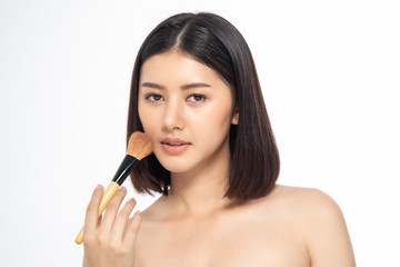 Beautiful Young Asian Woman short hair  with Clean Fresh Skin. Face care, Facial treatment, Cosmetology, beauty and healthy skin and cosmetic ideas concept.