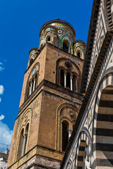 Obraz premium The tower of the old cathedral in Amalfi on the beautiful Italian Amalfi Coast