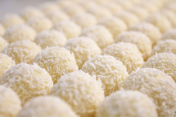 Round sweets with coconut. Raw handmade candy, healthy dessert.