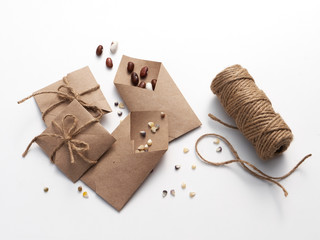 Heritage, heirloom garden seeds in home made brown paper packets, collected in the fall and ready...