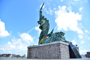 Naga sculptures spraying water A symbol of Songkhla Province, Thailand The floating Spraying water into the estuary lake is popular with tourists,Take pictures Songkhla Province,Thailand April 4, 2015