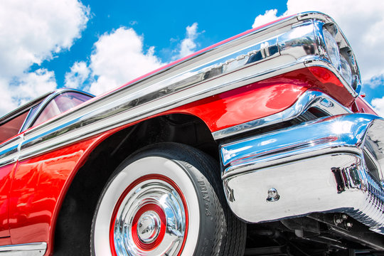 Profile of a red 1958 Oldsmobile Super 88.