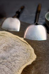 Thai street food-traditional Thai pancakes fried on a pancake close-up.