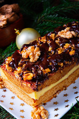 Chocolate gingerbread with filling, jam and nuts