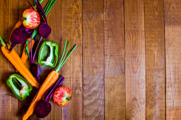 Fresh vegetables on wooden background