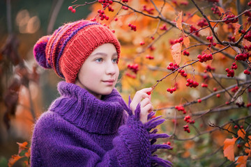 girl in an orange knitted hat
