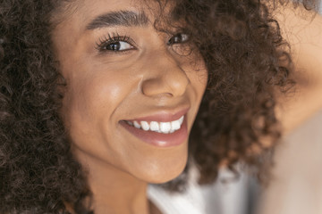 Close up of pretty female that demonstrating her smile