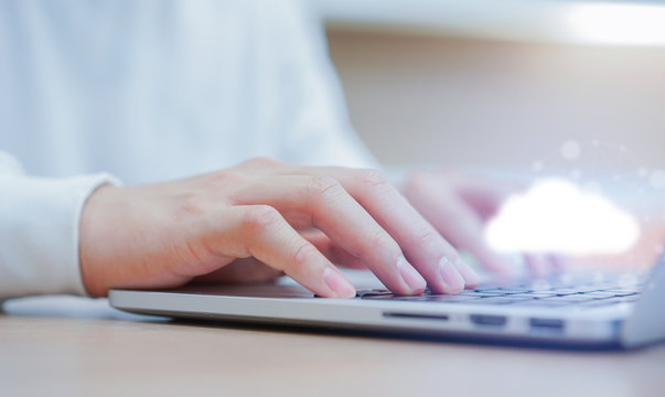 close up computer programmer man hand typing on keyboard for transfer or synch data upload and download from cloud computing with virtual interface in operation room, technology business concept	
