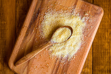 Gelatin powder and jelly on background