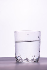 glass of fresh water on a white background