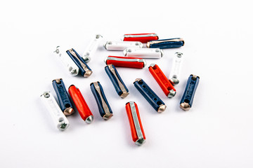 Torpedo fuses different ampers on isolated white backgrounds. Electric car parts.