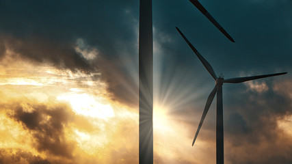 Windkraft Anlagen in dramatischer Lichtstimmung 