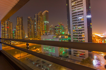 modern buildings in Dubai city, night scene. UAE