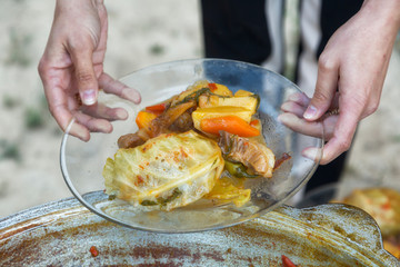 Dymlyama - Uzbek national dish on a transparent plate