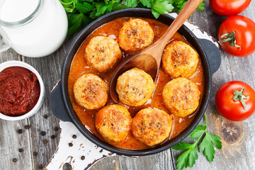 Meatballs in creamy tomato sauce