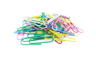 Colored paper clips on white background. A lot of paper clips