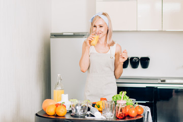 Young woman cooking in the kitchen