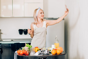 Young woman cooking in the kitchen